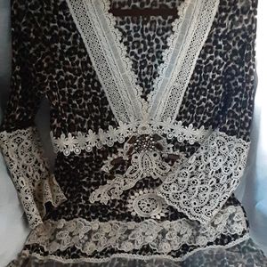 Lencing Blouse . Size L; Stretchy.  See Pics for measures